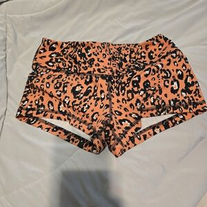 Fleo Orange and Black Athletic Shorts Leopard Print